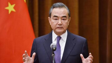 وزیر خارجه چین:نیروهای خارجی به گونه ای مسئولانه افغانستان را ترک کنند