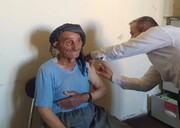 پیرمرد ۱۱۹ ساله اهل بانه واکسن کرونا دریافت کرد